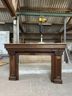 Cheminée en chêne style néoclassique circa 1900